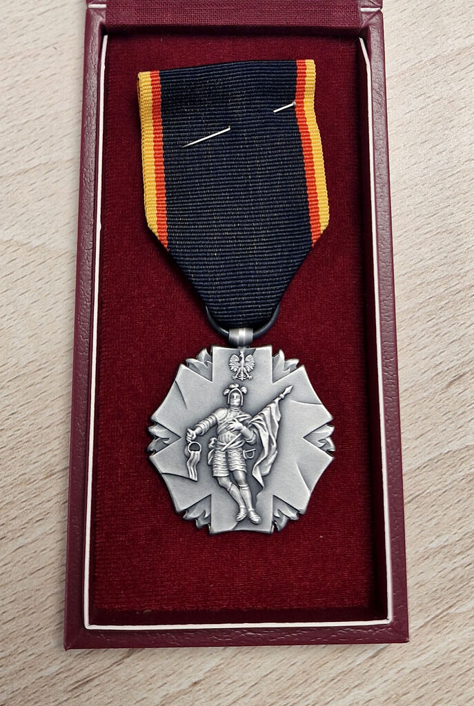 Prezes Roman Bąk odznaczony Krzyżem św. Floriana