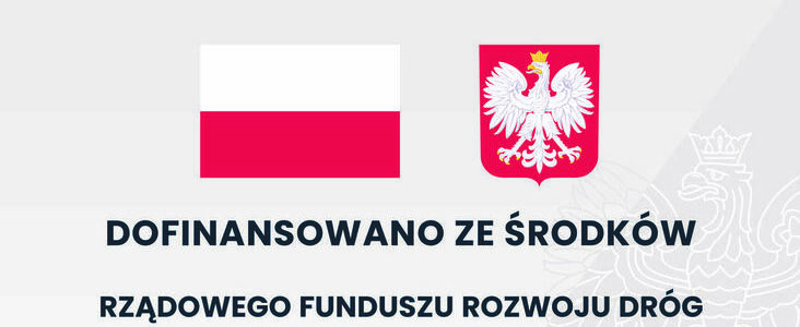 Flaga i godło Polski z napisem Dofinansowano ze środków rządowego rozwoju dróg.