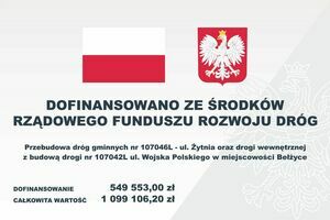 Flaga i Godło Polski. Granatowy napis: Dofinansowano ze środków Rządowego Funduszu Rozwoju Dróg