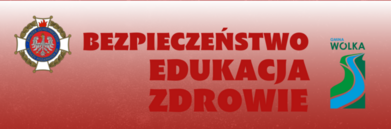 Baner z napisem "BEZPIECZEŃSTWO EDUKACJA ZDROWIE", emblematem straży pożarnej, herbem gminy Wólka i graficznym symbolem w kształcie fali.