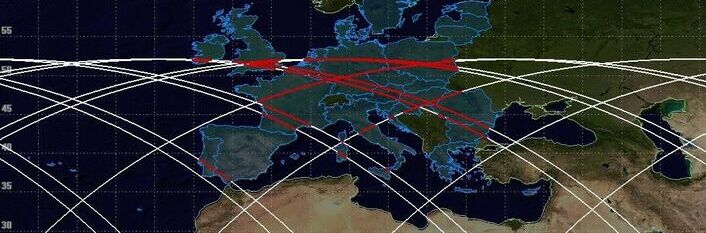 Mapa Europy z zaznaczonymi krajami. Na mapie widnieją czerwone i białe linie, które przecinają kontynent, wskazując na możliwe trasy lub połączenia między różnymi punktami.