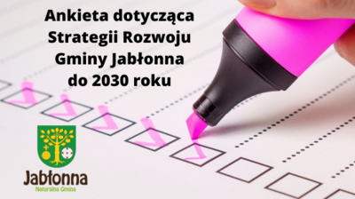 Zdjęcie różowego markera, którym zaznaczane są pola na kartce papier, tekst ankieta dotycząca strategii rozwoju Gminy Jabłonna do 2030