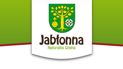 Herb gminy na banerze z napisem "Jabłonna" i hasłem "Naturalna Gmina", barwy zielono-białe z akcentami żółtymi i czerwonymi.