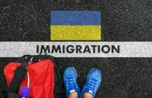 flaga Ukrainy i napis: immigration