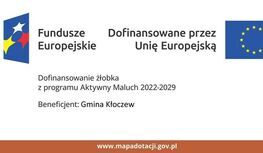 Tablica informacyjna: Fundusze Europejskie – dofinansowane przez Unię Europejską. Dofinansowanie żłobka z programu Aktywny Maluch 2022–2029. Beneficjent: Gmina Kłoczew. Na dole adres: www.mapadotacji.gov.pl oraz logotypy Funduszy Europejskich i Unii Europejskiej.