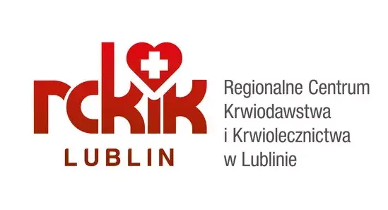 Logo Regionalnego Centrum Krwiodawstwa i Krwiolecznictwa w Lublinie. Napis "RCKIK" z dużą literą "K" i czerwonym sercem z białym krzyżem na górze.  Obok napisy w kolorze czerwonym.