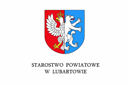 Herb przedstawiający dwie połówki: białego orła z koroną na czerwonym tle i białego niedźwiedzia na niebieskim tle. Poniżej napis: "STAROSTWO POWIATOWE W LUBARTOWIE".