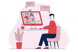 Grafika przedstawia mężczyznę siedzącego przy biurku,  na którym stoi laptop