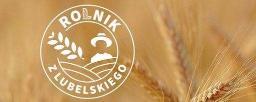 Rolnik z lubelskiego - logo na tle kłosów