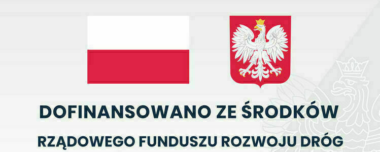 Tablica informacyjna dofinansowano ze środków Rządowego Funduszu Rozwoju Dróg. Flaga i godło Polski.