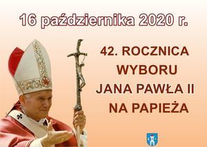 Prostokątny plakat z czerwonymi napisami. Po lewej stronie widać Świętego Jana Pawła II. Na dole na środku znajduje się herb Świebodzic. 