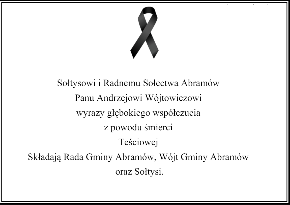 Zdjęcie zawiera kondolencje z czarną wstążką żałobną na górze oraz dedykację poświęconą Andrzejowi Wójcikowi. Tekst wyraża współczucie z powodu śmierci, składane przez sołtysów i radnych, wójt gminy.