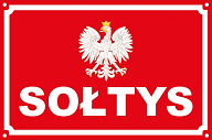 Czerwony prostokątny znak z białym orłem w koronie na środku i białymi napisami "SOŁTYS" u góry i na dole.