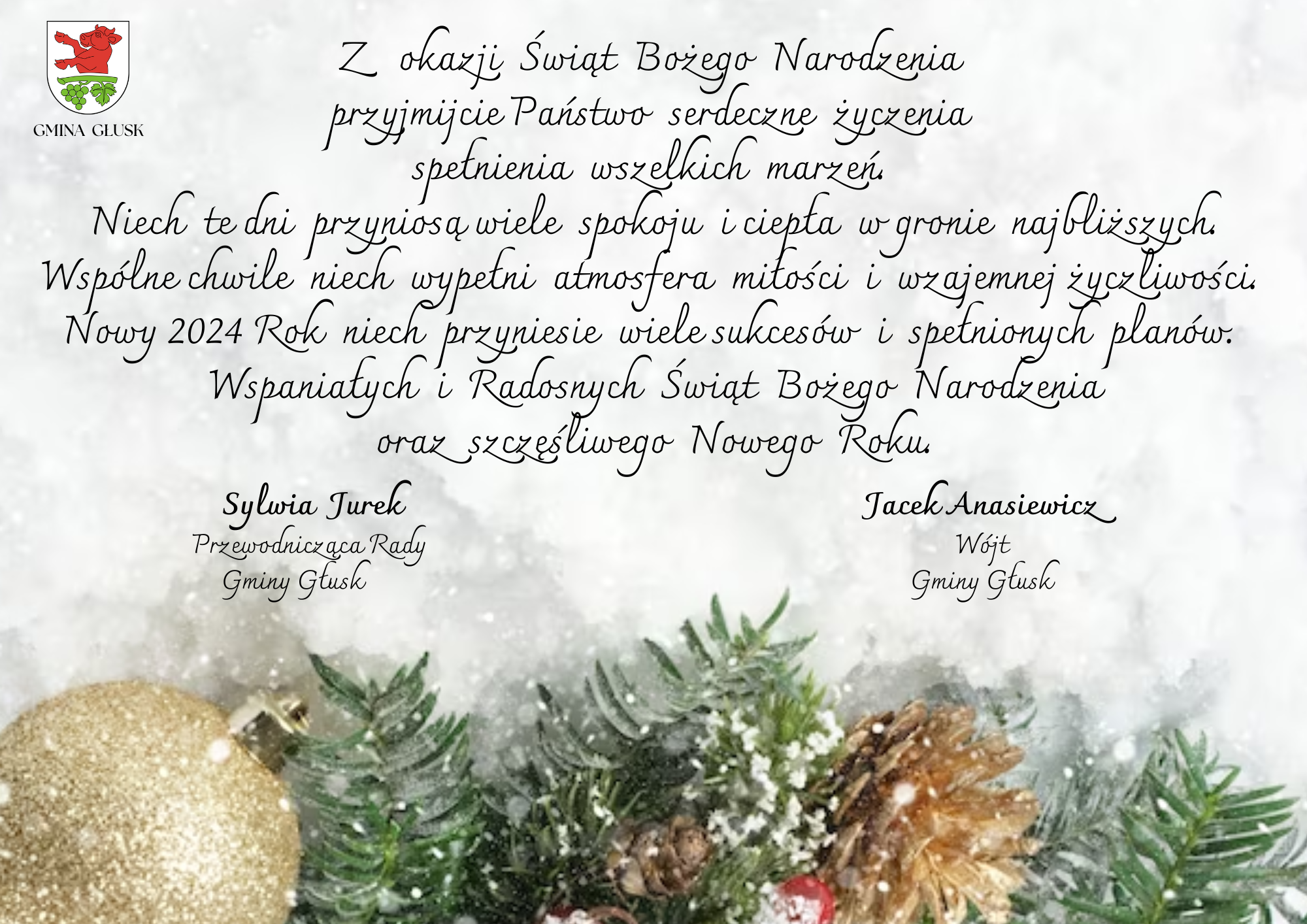 Zdjęcie przedstawia kartkę świąteczną z życzeniami. Na dole widać gałązkę choinkową oraz złotą bombkę, a w górnej części kartki tekst z życzeniami w języku polskim.