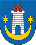 Herb z białą wieżą na niebieskim tle. Wieża umieszczona jest na złotym półksiężycu, po bokach którego widnieją dwie złote gwiazdy. Dach wieży jest czerwony.